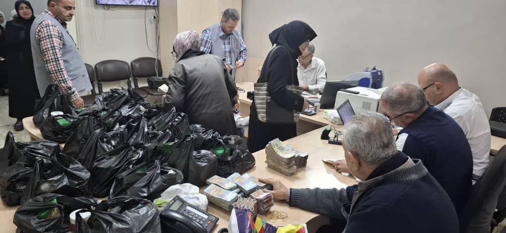 توزيع المساعدات الشهرية النقدية والعينية للعائلات المسجلة — صورة 10