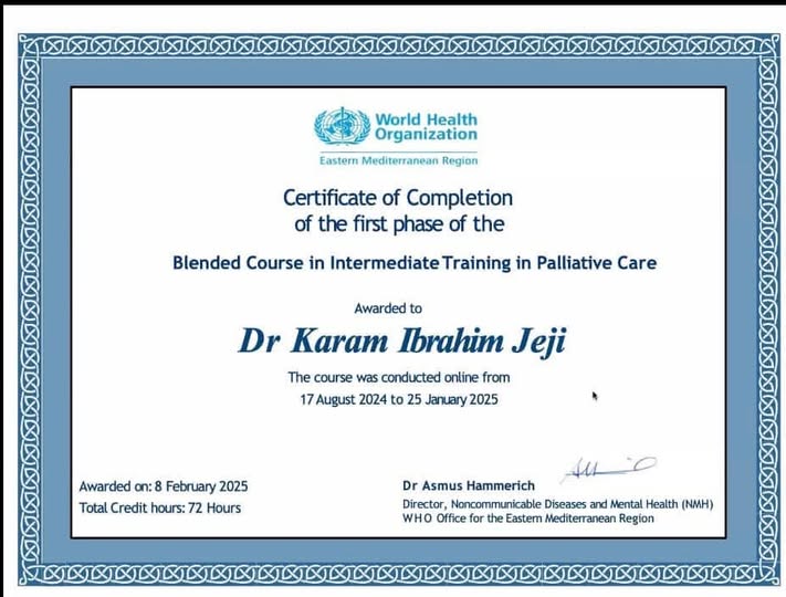 Congratulating Dr Karam Jeji on palliative care training